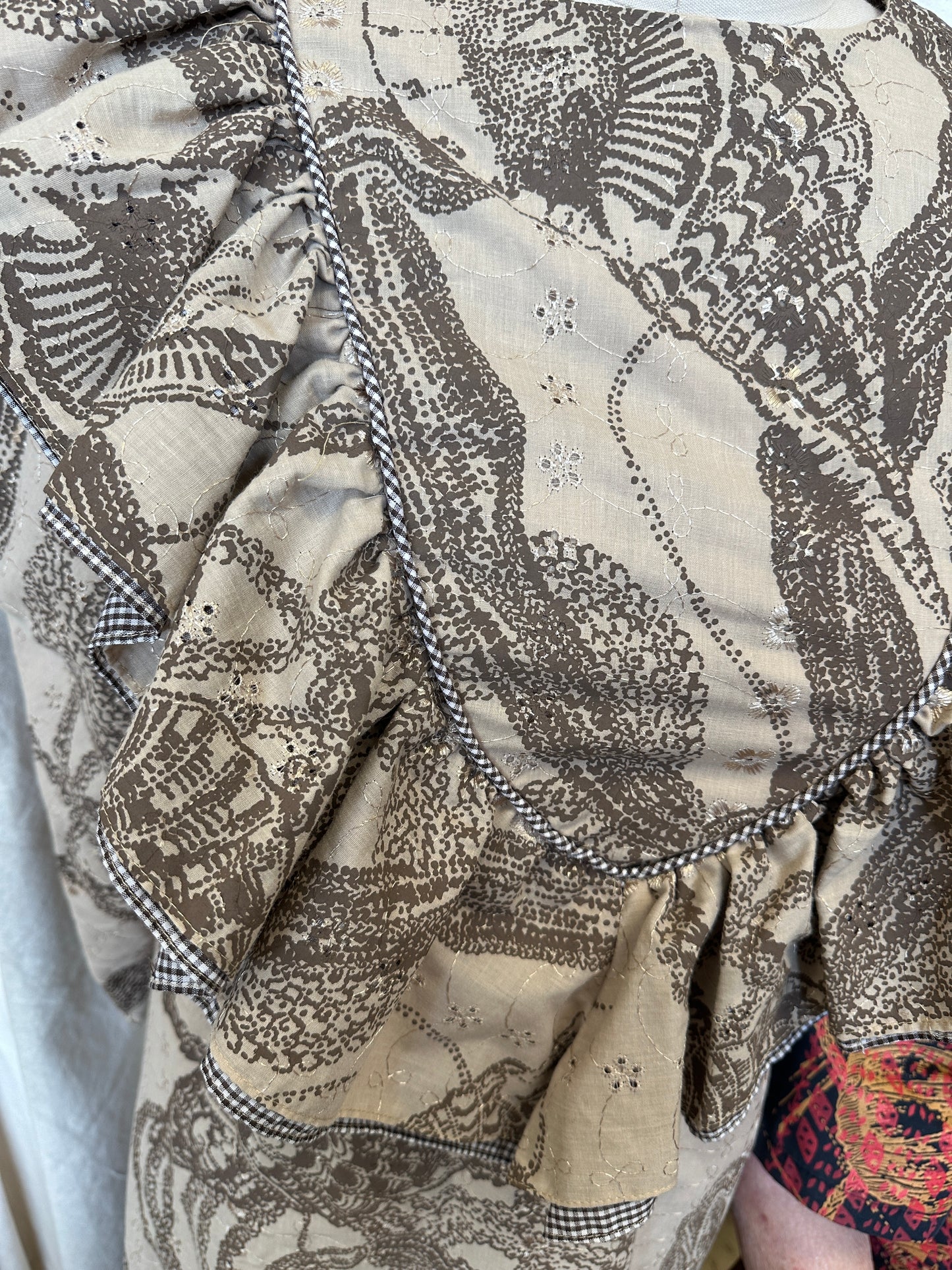 Gently used Long Sleeve Deep V Ruffle Mu'u | Ni'ihau Shells | Brown on Tan Eyelet